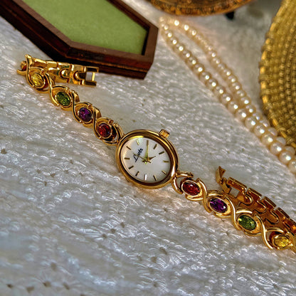 Luxury women's watch with colorful tourmalines