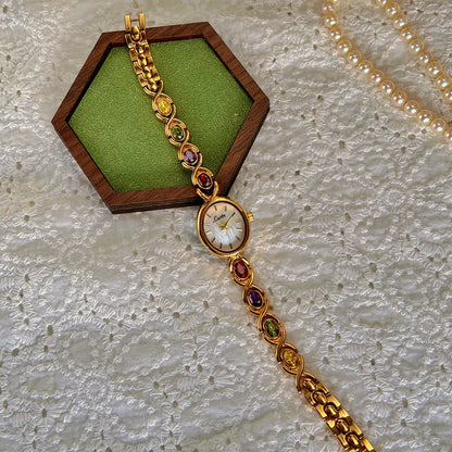 Luxury women's watch with colorful tourmalines