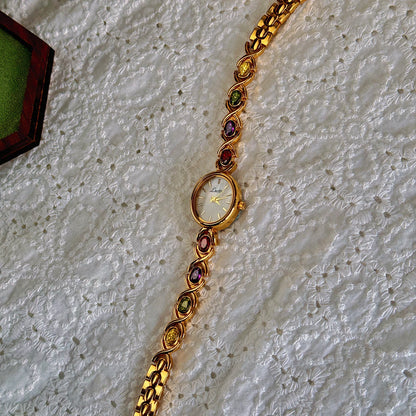 Luxury women's watch with colorful tourmalines